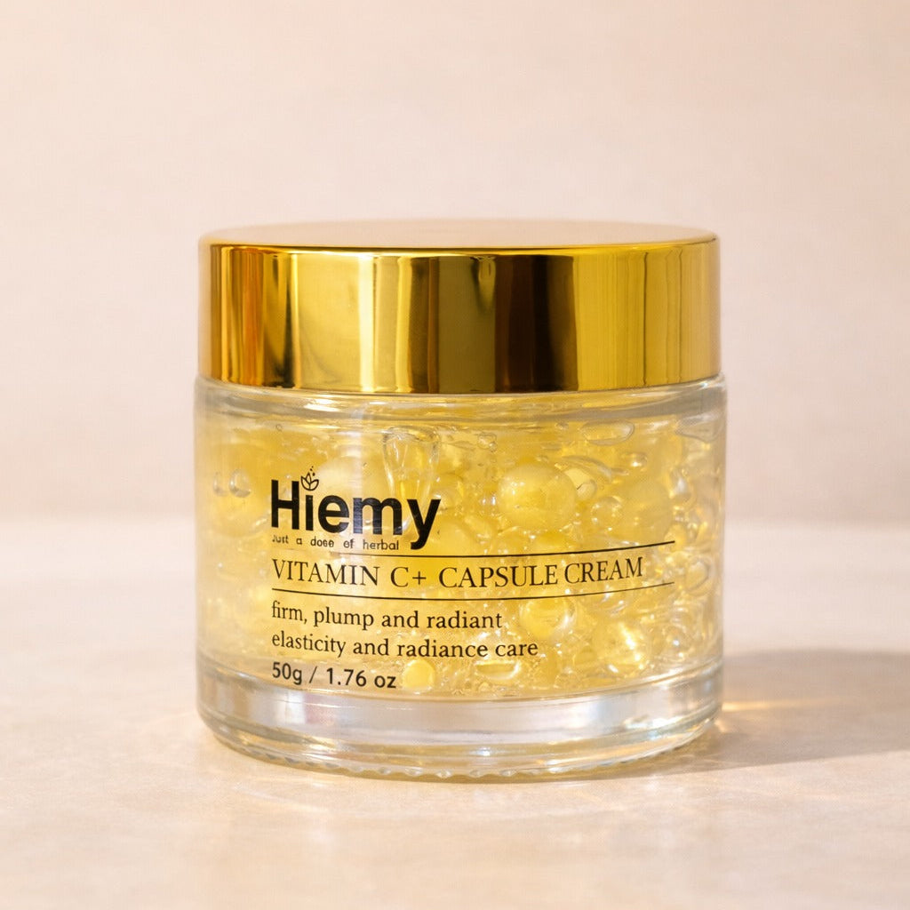 Jar of Heamy Vitamin C+ Capsule Cream on a beige background